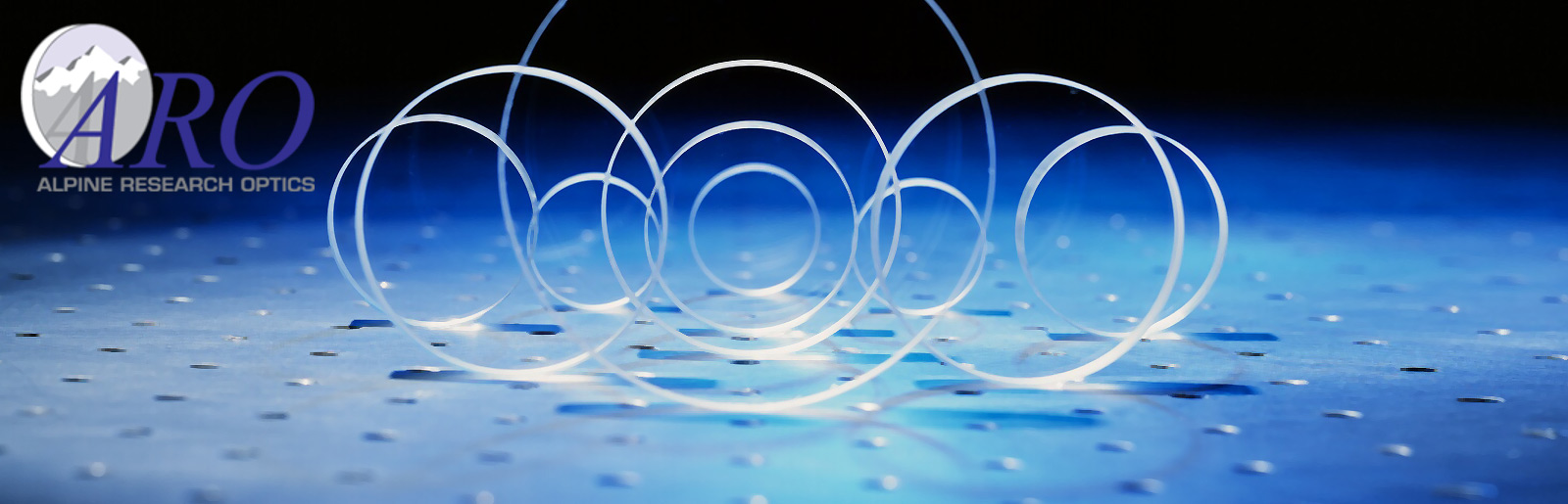 Transparent circular objects on a blue surface